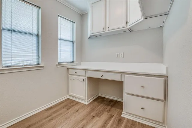 a view of a porch with wooden floor