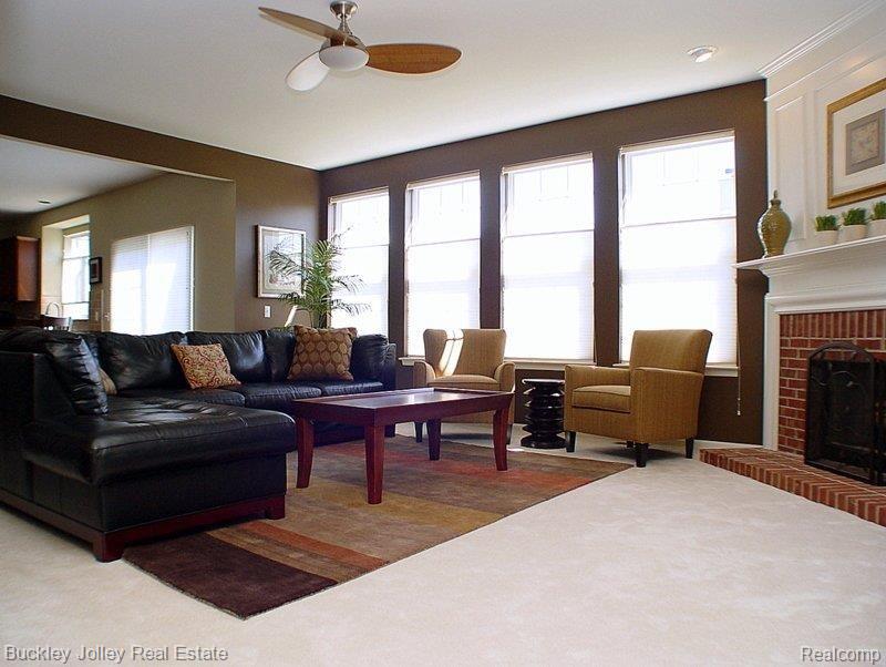 4269 Merriman Loop Howell, MI 48843 - Photo 10 of 23 Kitchen Overlooks the Great Room
