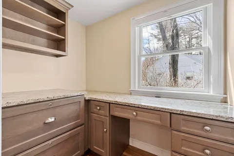 storage and utility room with window