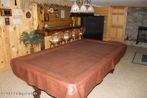 255 Wheeler Road Clarkson, KY 42726 - Photo 37 of 54 Basement with wet bar and gas fireplace