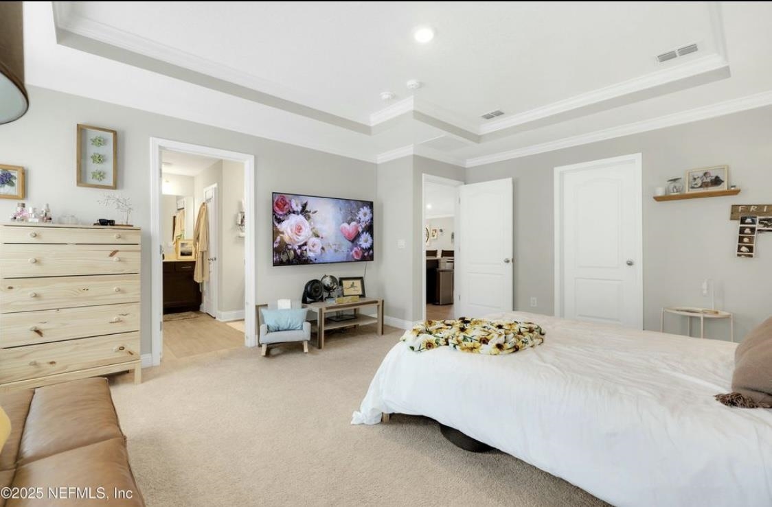 49 Narvarez Avenue St. Augustine, FL 32084 - Photo 10 of 17 a bedroom with a bed and dresser