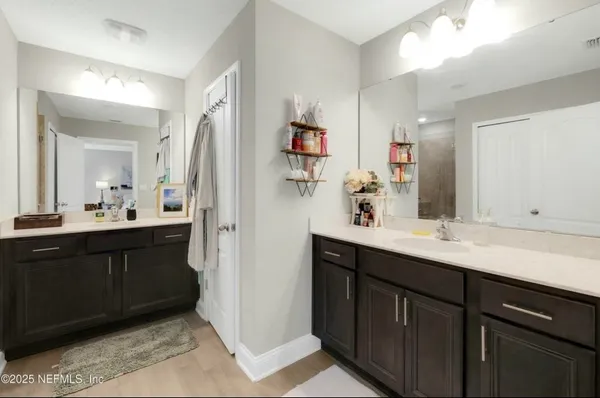 a bedroom with a bed and dresser