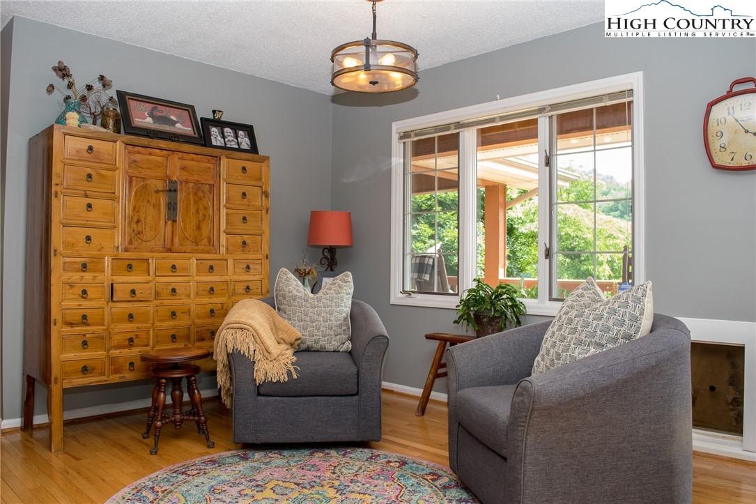 4850 US Highway 421 Vilas, NC 28692 - Photo 12 of 46 a living room with furniture and a window