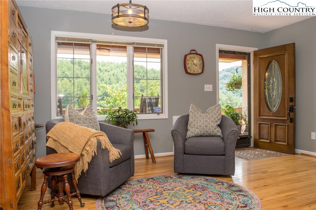 4850 US Highway 421 Vilas, NC 28692 - Photo 13 of 46 a living room with furniture and a window