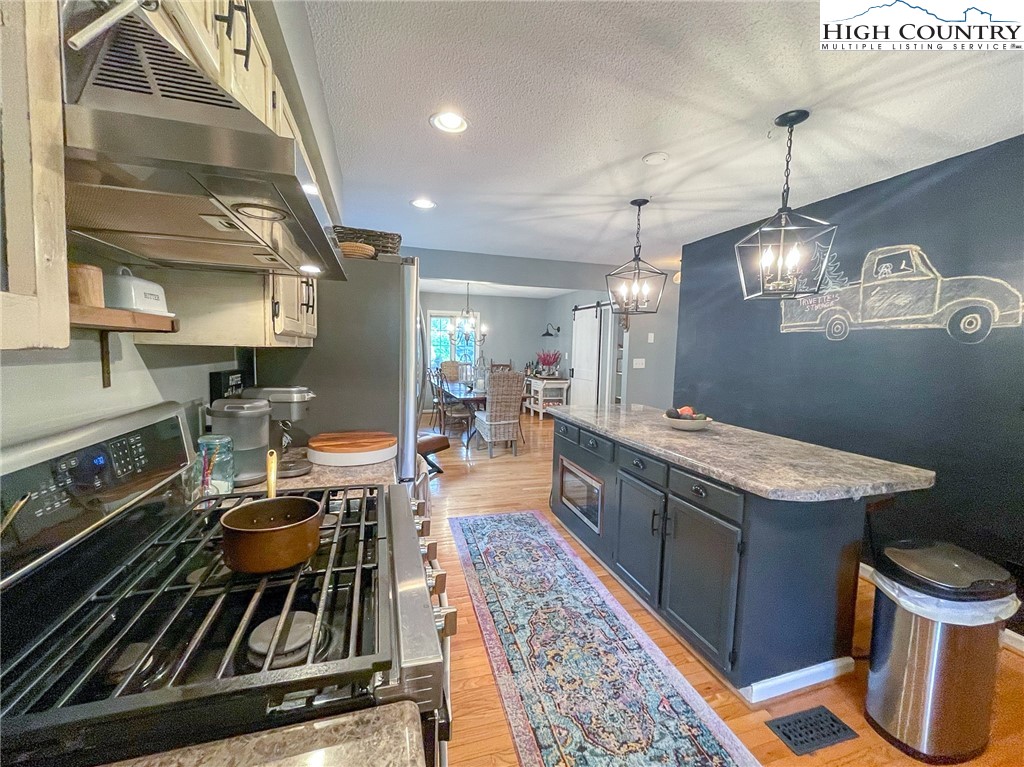 4850 US Highway 421 Vilas, NC 28692 - Photo 19 of 46 a kitchen with a stove and a sink