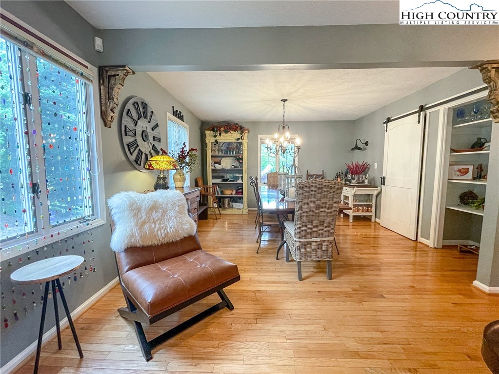 4850 US Highway 421 Vilas, NC 28692 - Photo 24 of 46 a living room with furniture and wooden floor