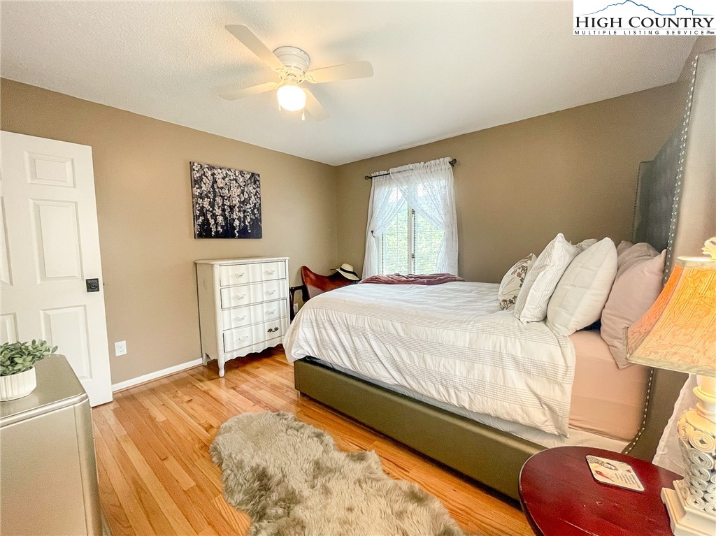 4850 US Highway 421 Vilas, NC 28692 - Photo 31 of 46 a bedroom with a bed and a couch