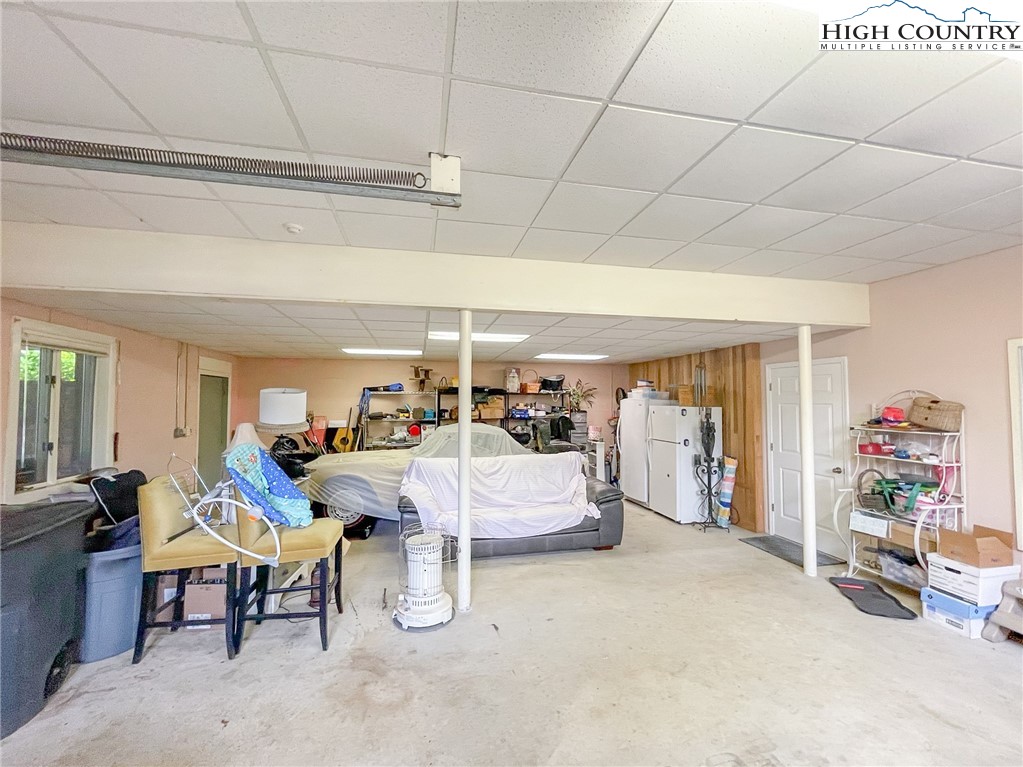 4850 US Highway 421 Vilas, NC 28692 - Photo 40 of 46 a living room with furniture and a flat screen tv