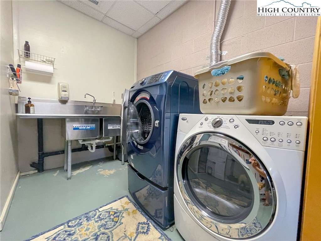 4850 US Highway 421 Vilas, NC 28692 - Photo 41 of 46 a utility room with dryer and washer