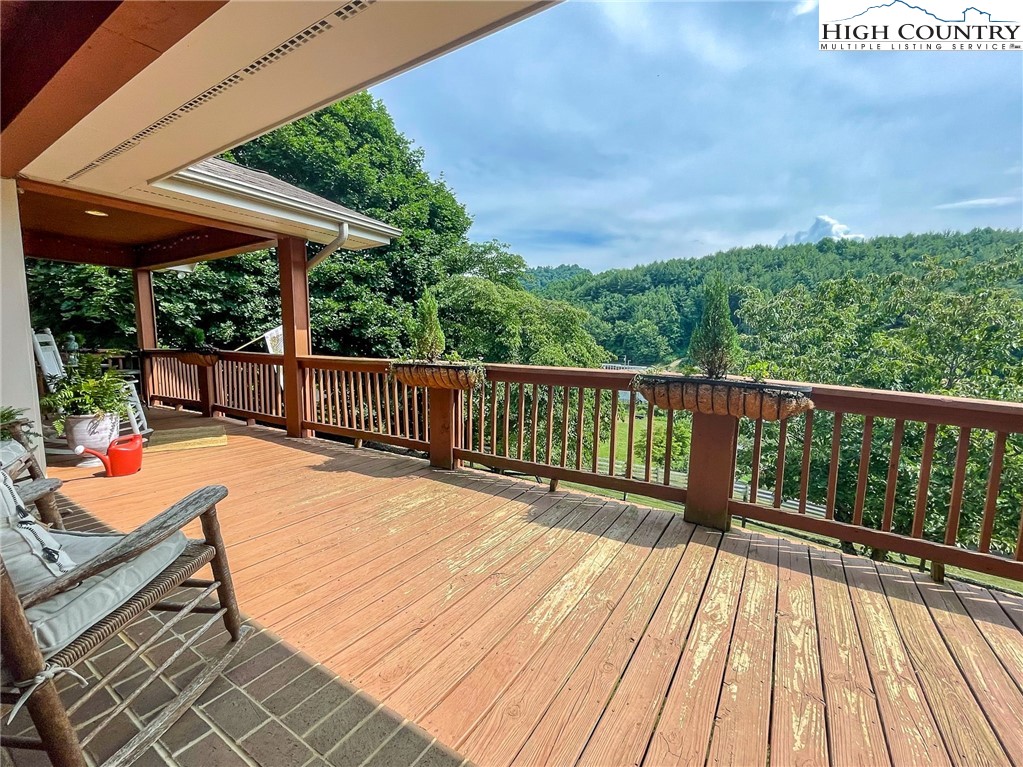 4850 US Highway 421 Vilas, NC 28692 - Photo 42 of 46 a balcony with wooden floor and outdoor space