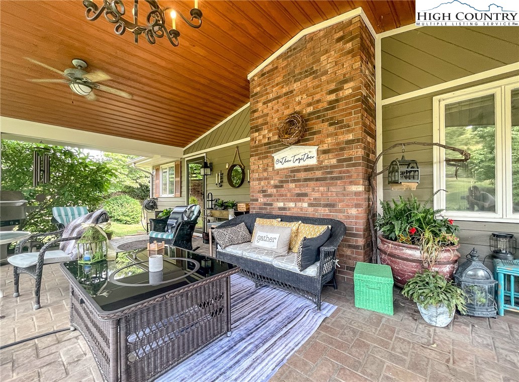 4850 US Highway 421 Vilas, NC 28692 - Photo 9 of 46 a living room with furniture and a potted plant