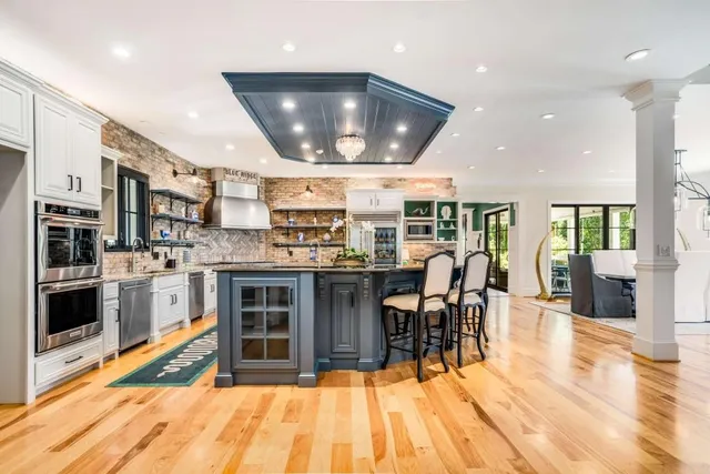 a view of a dining room with furniture and window