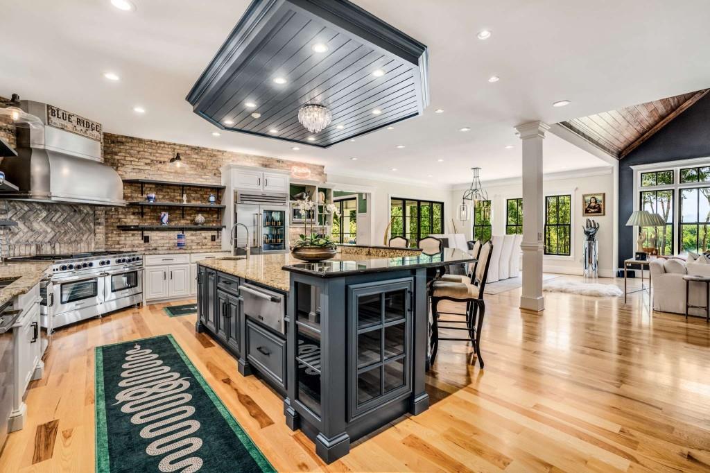 254 Nicholson Road Blue Ridge, GA 30513 - Photo 19 of 86 a kitchen with stainless steel appliances granite countertop lots of counter top space a sink and stainless steel appliances
