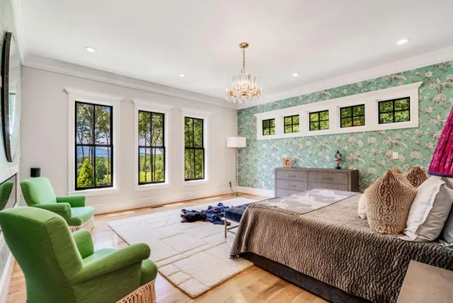 a large kitchen with a stove and cabinets