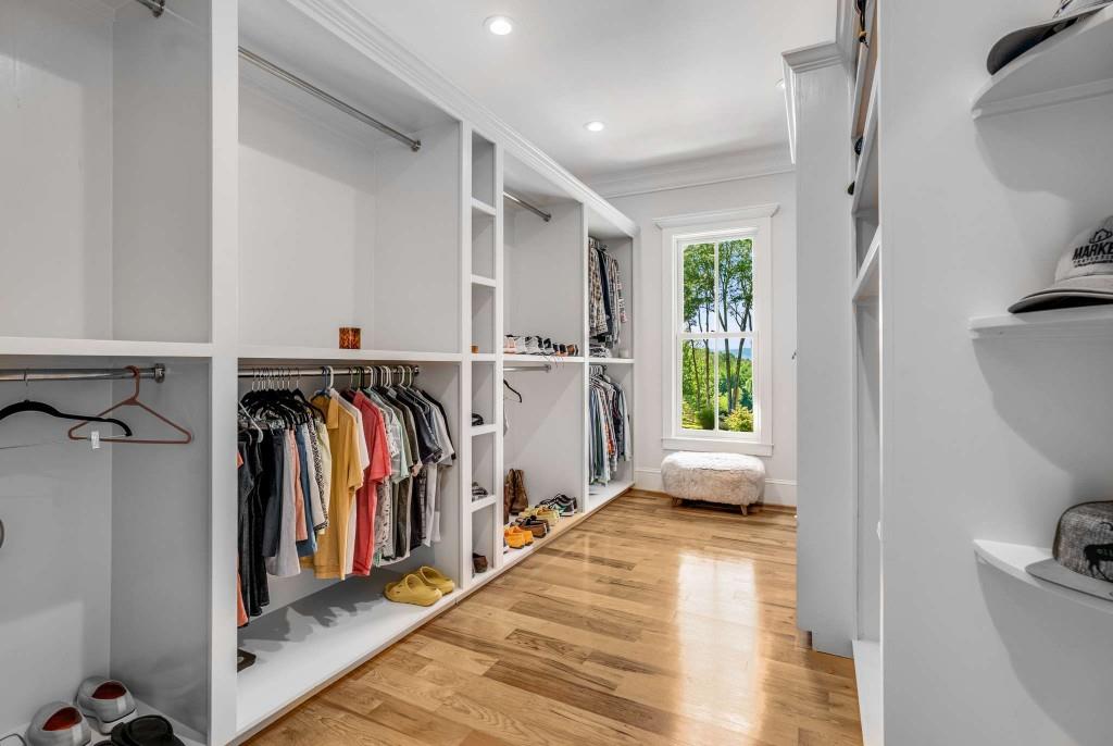 254 Nicholson Road Blue Ridge, GA 30513 - Photo 30 of 86 a view of walk in closet with clothes and shoes