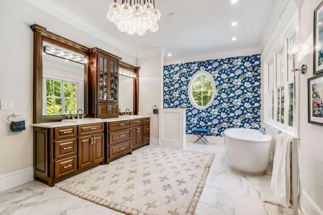 a living room with fireplace furniture and a flat screen tv