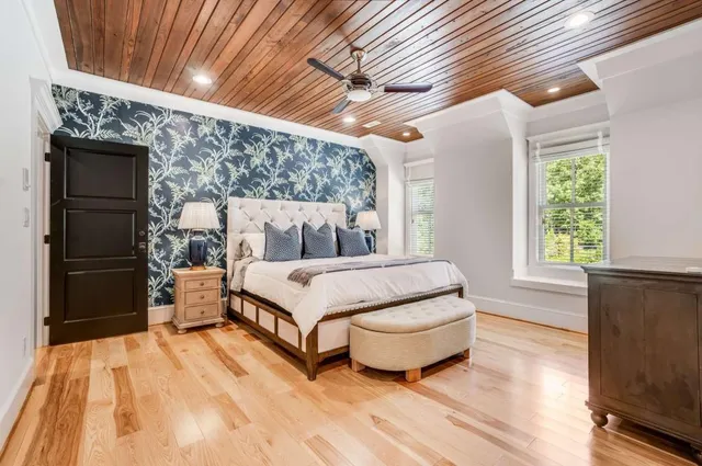 a view of a garage with cars parked