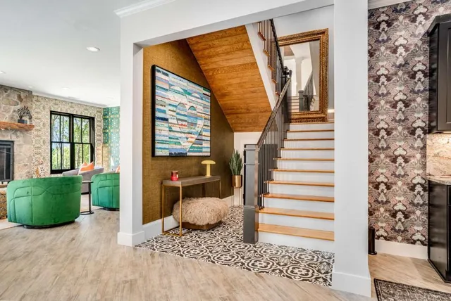 an aerial view of a house with a garden