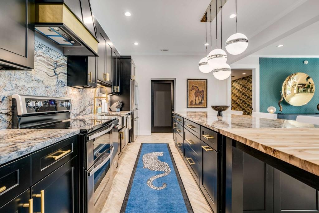 254 Nicholson Road Blue Ridge, GA 30513 - Photo 50 of 86 a large kitchen with a stove and cabinets