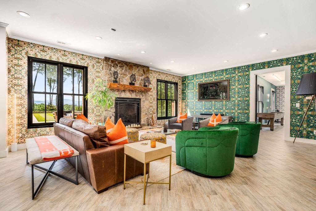 254 Nicholson Road Blue Ridge, GA 30513 - Photo 54 of 86 a living room with fireplace furniture and a large window