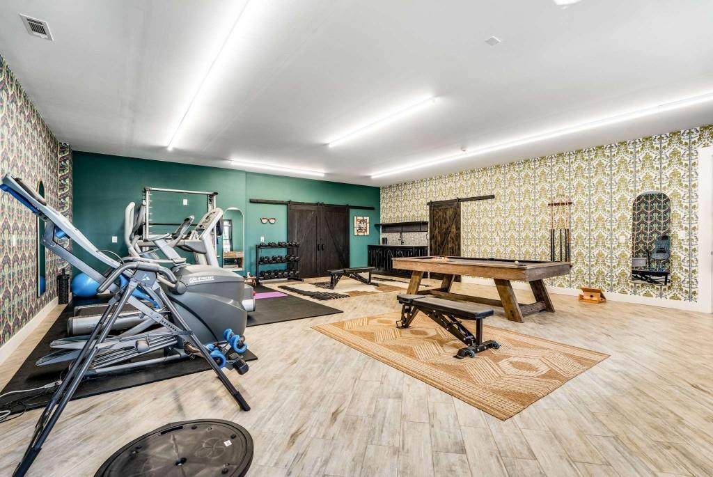 254 Nicholson Road Blue Ridge, GA 30513 - Photo 60 of 86 a view of a room with gym equipment