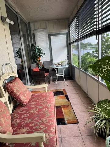 a view of swimming pool with chairs