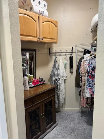 a view of a storage and utility room