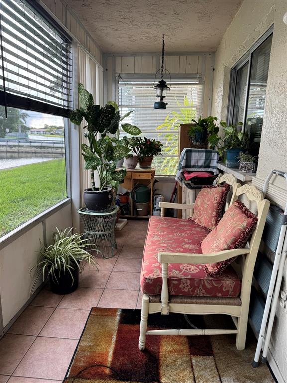 9400 Lime Bay Boulevard, Unit 112 Tamarac, FL 33321 - Photo 32 of 37 a outdoor space with furniture