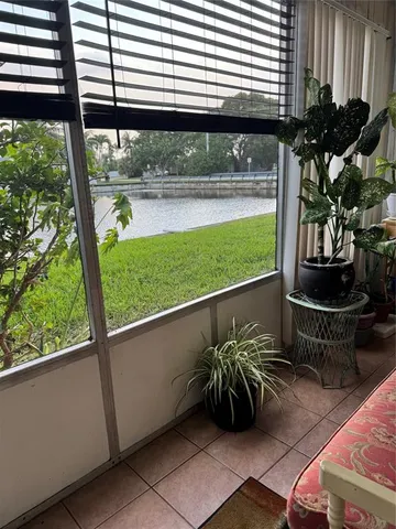 a view of a back yard from a balcony