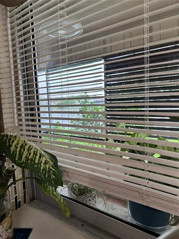 a table and chairs in a balcony