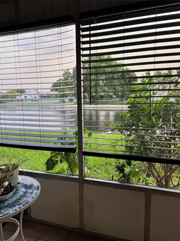 9400 Lime Bay Boulevard, Unit 112 Tamarac, FL 33321 - Photo 37 of 37 a view of a lake from a window