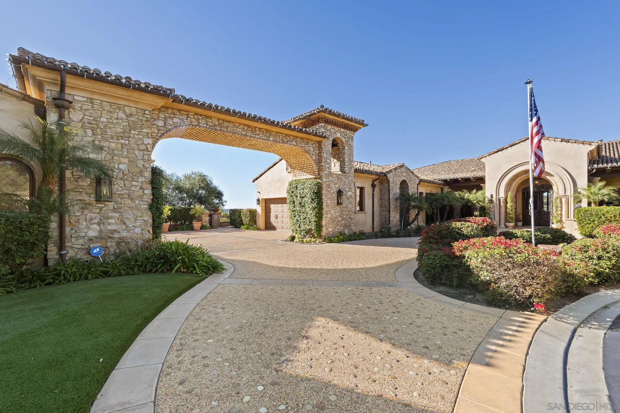 18486 Via Candela Rancho Santa Fe, CA 92091 - Photo 3 of 34 a view of a house with a yard