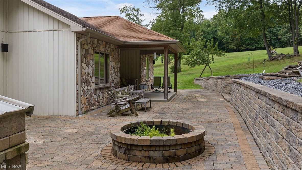 57430 Ohio Riverview Road Shadyside, OH 43947 - Photo 26 of 35 View of patio / terrace featuring a firepit