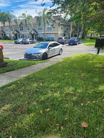a front view of a building with garden