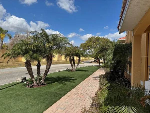 a view of a backyard with garden