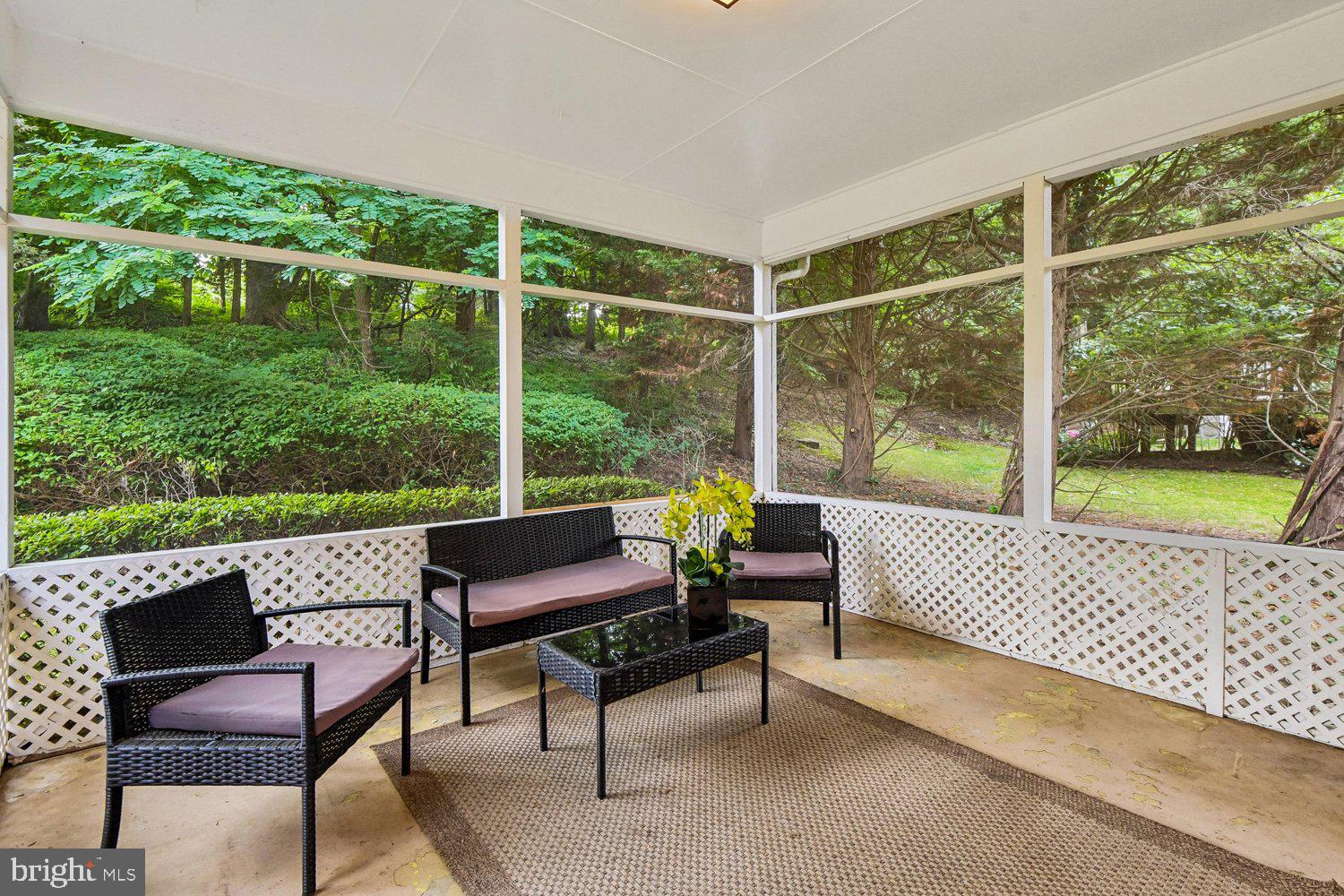 1518 Winchester Road Annapolis, MD 21409 - Photo 24 of 70 a roof deck with a bench and a garden