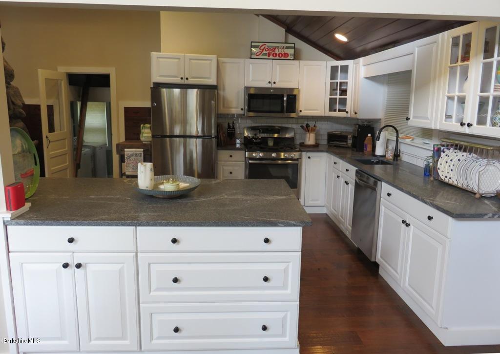 249 Old Pond Road Becket, MA 01223 - Photo 8 of 20 a kitchen with appliances a sink and cabinets
