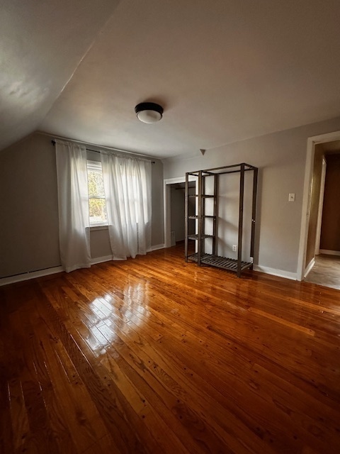 403 16th Street Mendota, IL 61342 - Photo 11 of 17 a view of an empty room with window and wooden floor