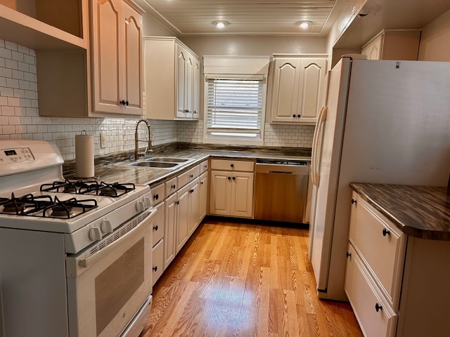 403 16th Street Mendota, IL 61342 - Photo 2 of 17 a kitchen with granite countertop a sink stove and refrigerator