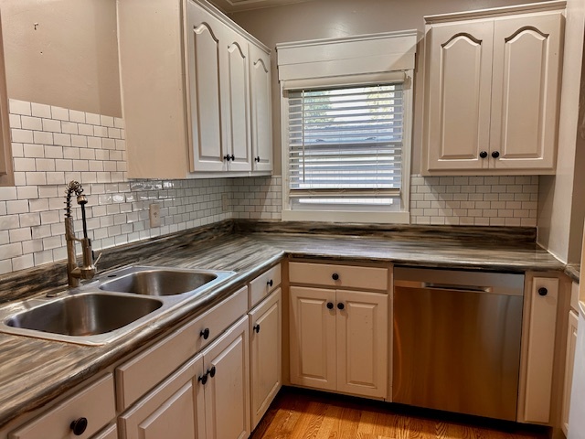 403 16th Street Mendota, IL 61342 - Photo 3 of 17 a kitchen with granite countertop white cabinets and sink