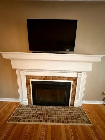 a stove top oven sitting inside of a kitchen