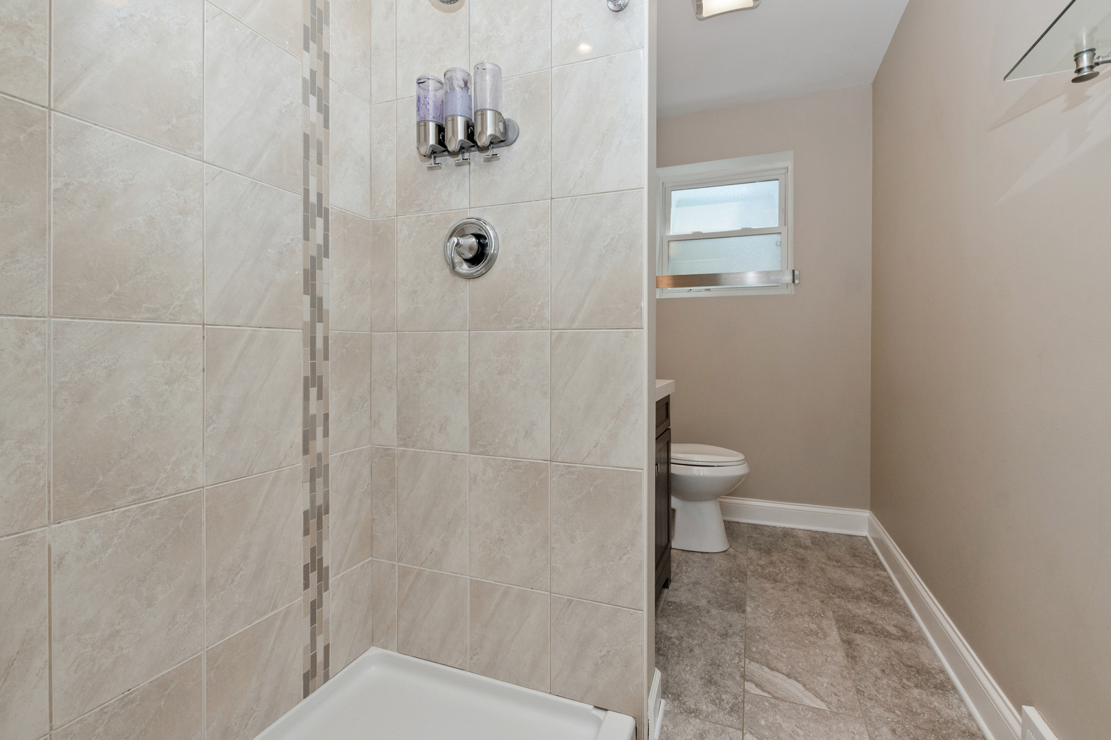 2860 Birch Road Homewood, IL 60430 - Photo 11 of 24 a bathroom with a toilet and shower