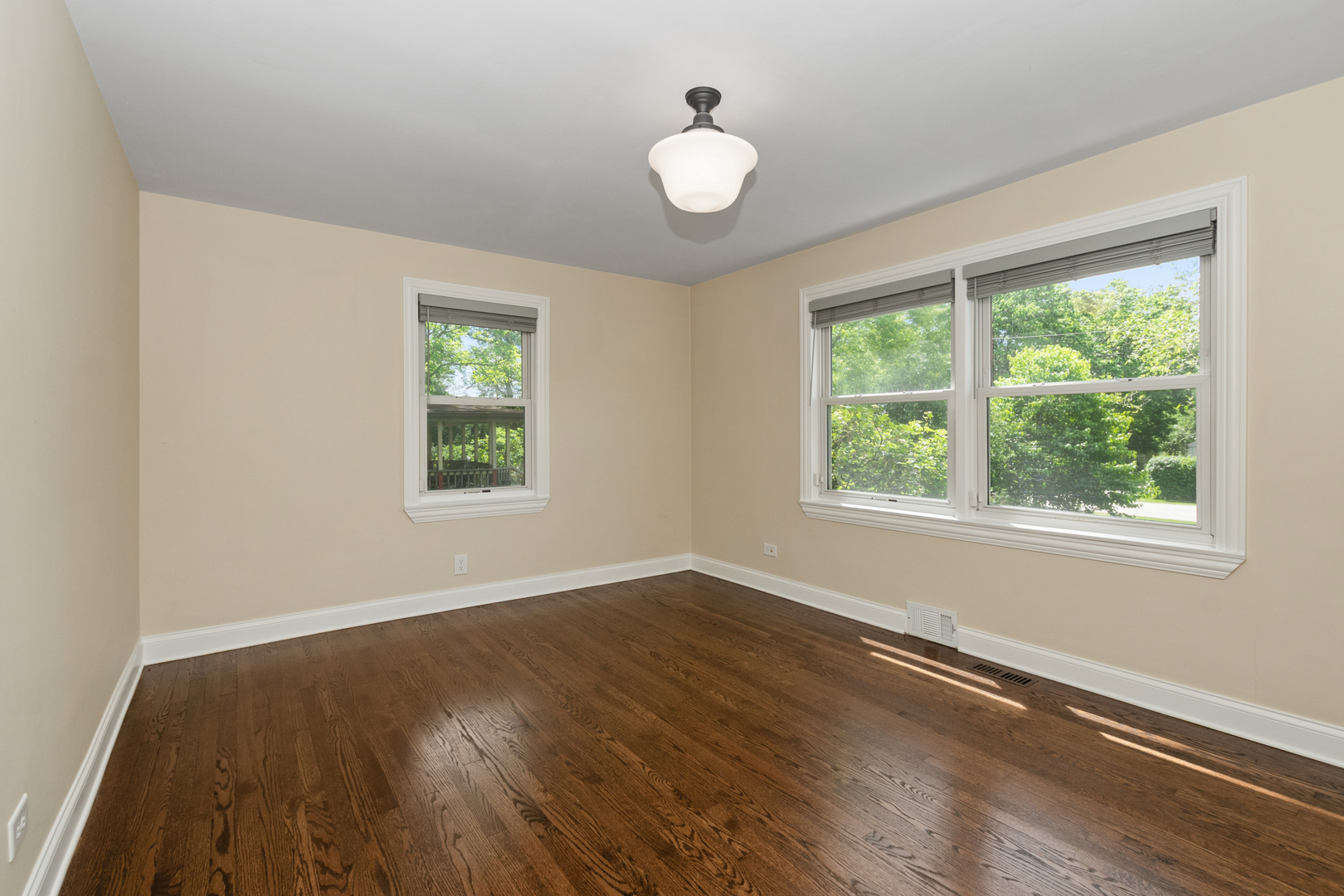 2860 Birch Road Homewood, IL 60430 - Photo 12 of 24 a view of an empty room with wooden floor and a window