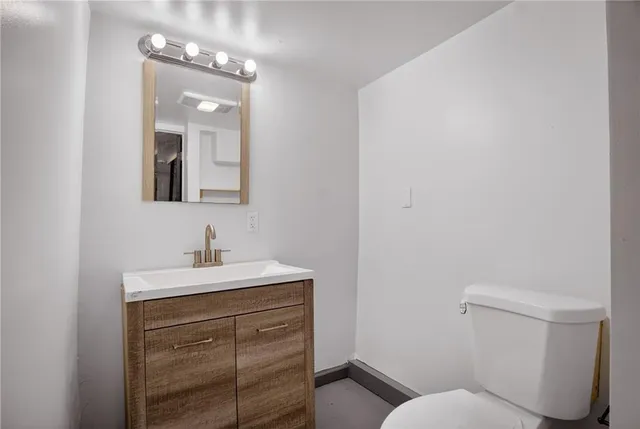 a view of balcony with wooden floor and door