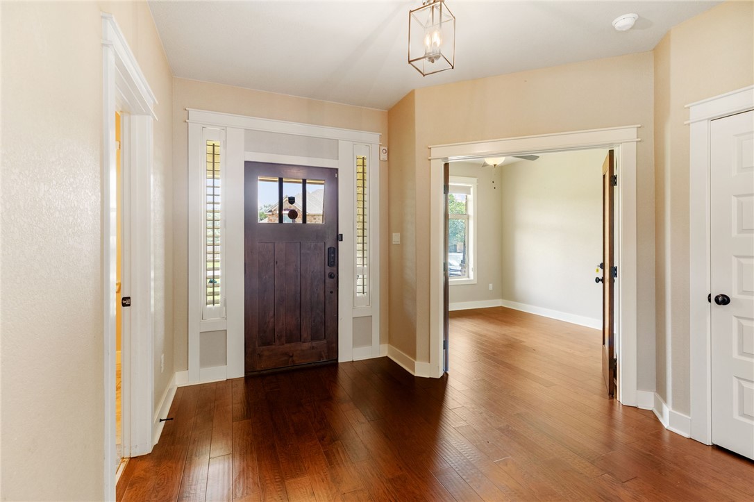 2136 Rockcliffe Loop College Station, TX 77845 - Photo 9 of 48 a view of a hallway with wooden floor