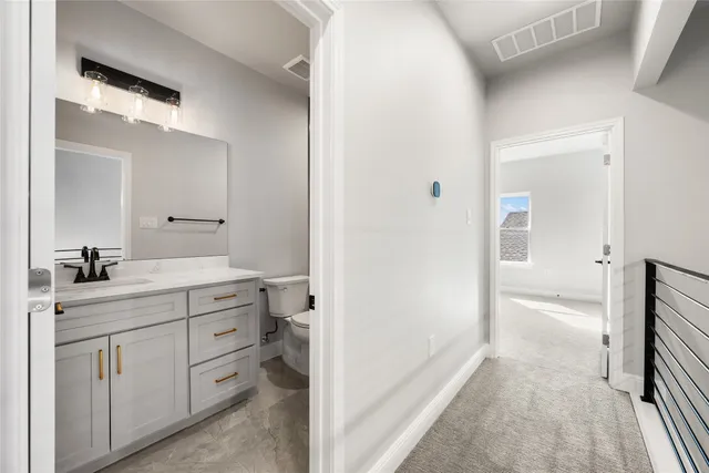 a hallway with wooden floor