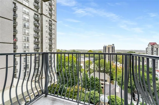 a view of a balcony with an outdoor space