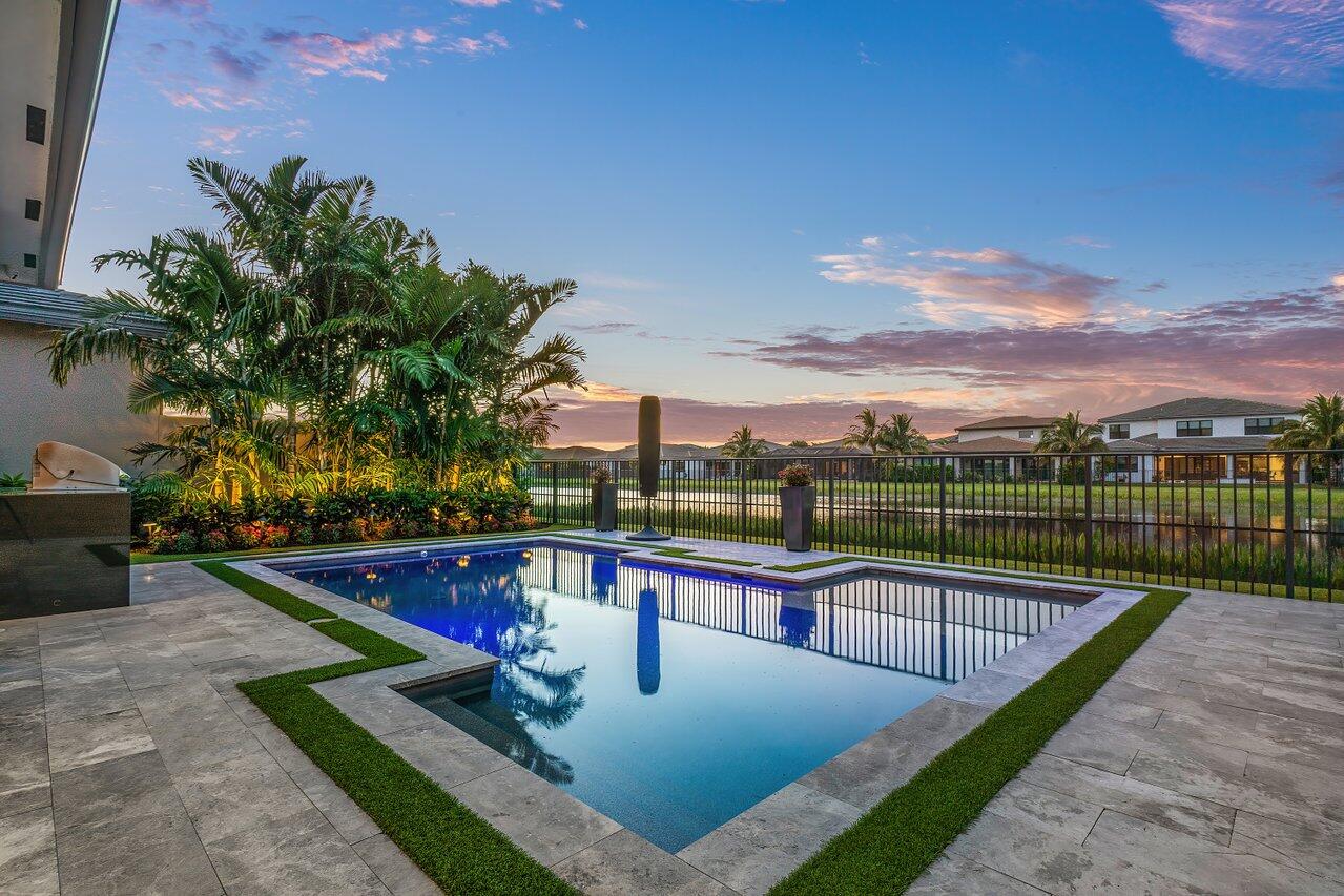 8581 Dearborn River Way Boca Raton, FL 33496 - Photo 33 of 53 a view of swimming pool with a patio
