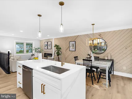 a very nice looking dining room with a table and chairs