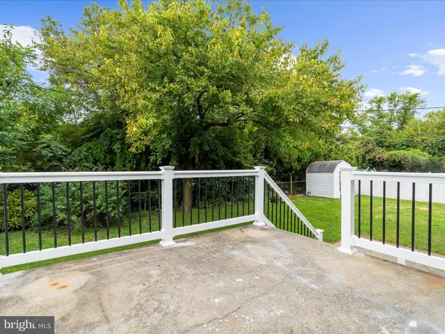 a view of backyard with green space